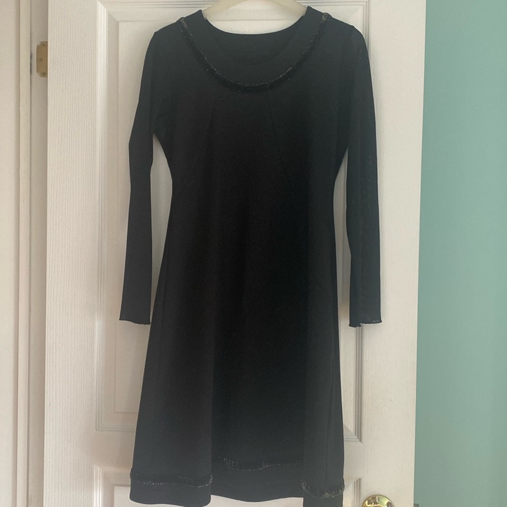 Very cute black dress with shimmery sleeves
